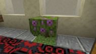 Flowering azalea bushes were added in the 1.18 Caves and Cliffs update (Image via Minecraft)